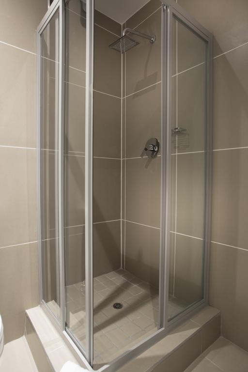 Апартаменты C.A.G - Upper East Side Сэндтон Номер фото